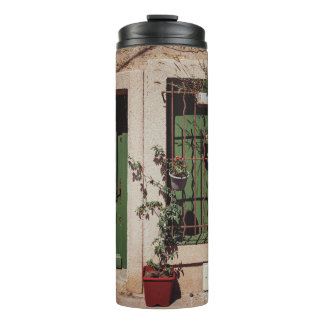 BOUTEILLES ISOTHERMES PORTE EN BOIS VERT AVEC PLANTE VERT