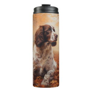 Bouteilles Isothermes Springer Spaniel dans les feuilles d'automne qui t