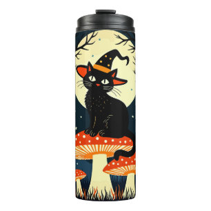 Bouteilles Isothermes Une petite chatte noire et magique assise sur un c