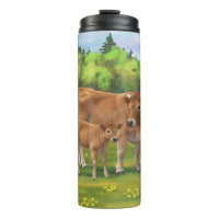 Vache d'Aubrac et veau mignon dans le pâturage de 