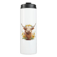 Vache Highland avec Couronne de fleurs de tourneso