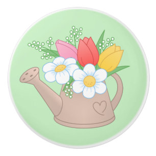 Bouton De Porte En Céramique Arrosage de jardin avec fleurs sur vert