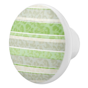 Bouton De Porte En Céramique Empreinte de léopard sur arrière - plan rayé.