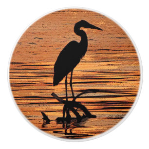 Bouton De Porte En Céramique Héron au bouton en céramique de coucher du solei
