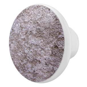 Bouton De Porte En Céramique Mur gris cru rugueux de construction de Beton