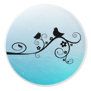 Bouton De Porte En Céramique Oiseau noir et bleu sur une branche fantaisiste