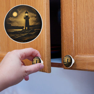 Bouton De Porte En Céramique Phare doré et noir sous la lumière de la lune