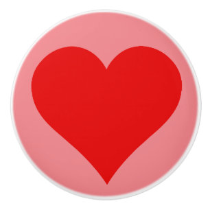 Bouton De Porte En Céramique Simple coeur rouge sur Arrière - plan rose en céra