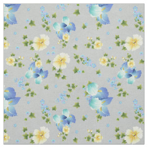 Boutons d'or jaunes et tissu d'Iris bleus