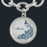 Bracelet Avec Breloques Bleu Peacock Leaf Vine Charme personnalisé Bracele<br><div class="desc">Personnalisez un cadeau unique pour vos demoiselles d'honneur avec un bracelet de charme personnalisé Blue Peacock Leaf Vine. Le design bracelet présente un arrière - plan gris clair avec un paon bleu vif orné d'un embellissement de vigne à feuilles. Personnalisez avec le nom de votre servante. Papeterie mariage supplémentaire et...</div>