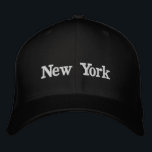 Brodée Casquette de New York<br><div class="desc">Voici notre Casquette "New York" - un accessoire intemporel et emblématique qui rend hommage à la ville qui ne dort jamais. Conçu avec un mélange de style et de sophistication urbaine, ce casquette est plus qu'un simple accessoire ; c'est une pièce de déclaration qui vous permet de porter un morceau...</div>