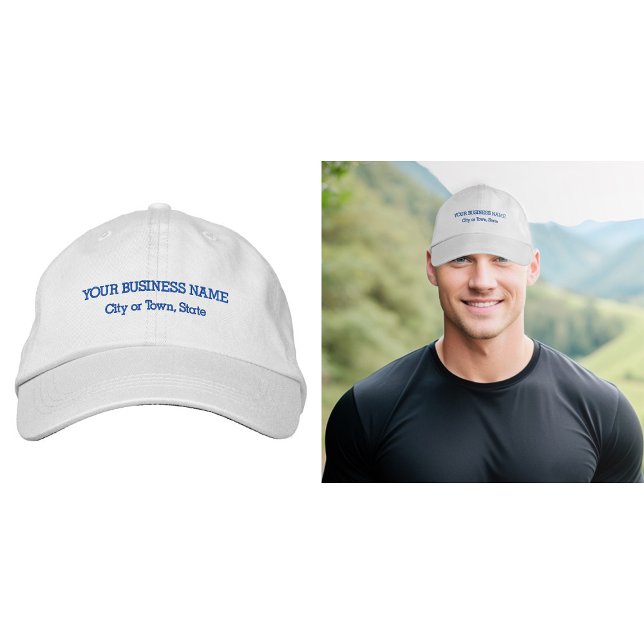 Brodée Texte commercial bleu brodé sur le Casquette (Business name and location embroidered on cap in blue thread)