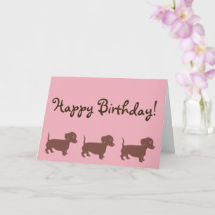 Brown Dachshunds rose Bonne carte d'anniversaire