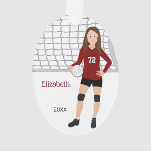 Brunette féminine de volley-ball en rouge et noir