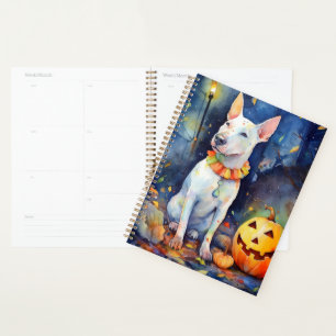 Bull Terrier Halloween avec citrouilles effrayant 