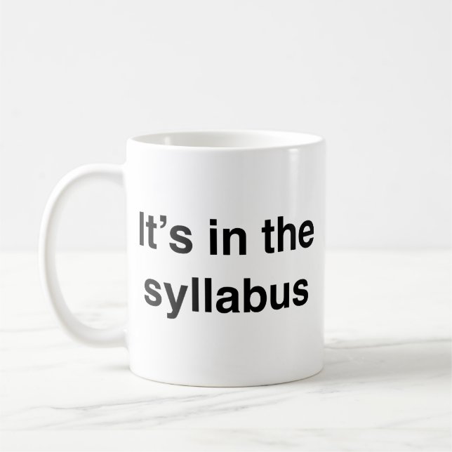 C’est dans le Syllabus Coffee Mug (Gauche)