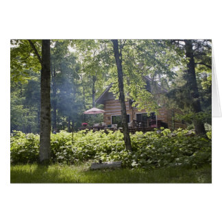 Cabine de journal dans Woods