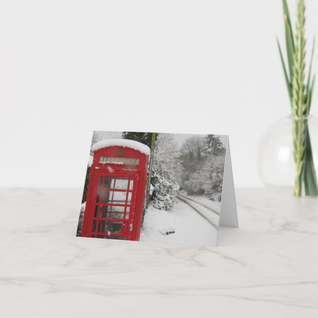 Cabine téléphonique dans une carte de neige blanch (Devant)