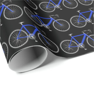 Cadeau bicyclette bleue sur papier d'emballage noir