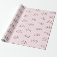 Bicyclettes roses sucrées sur papier d'emballage b