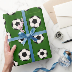 Cadeau Boule de football et papier d'emballage de la fêt