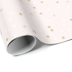 Cadeau Des étoiles d'or roses enveloppant du papier