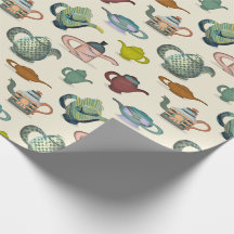 Pots de thé dans un joli papier d'emballage motif