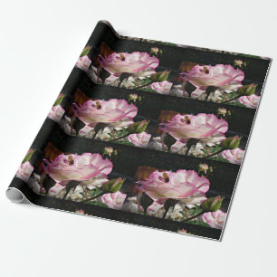 Cadeau Un rose, un bourgeon et un papier d'emballage