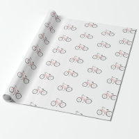 Vélos roses doux sur papier d'emballage blanc