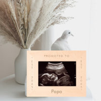 Promu à Papa Wooden