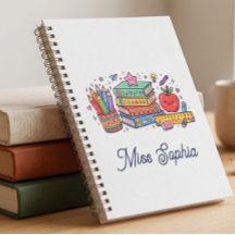 Cahier à spirale pour l'enseignant avec une pomme
