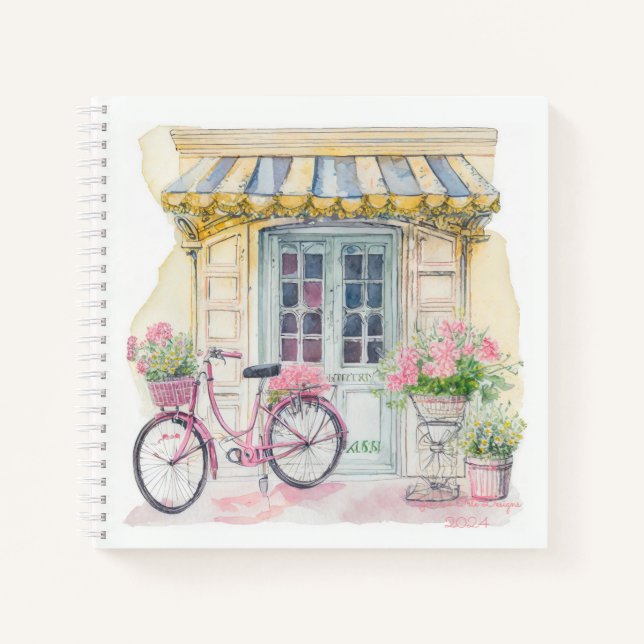 Cahier de bullet journal à vélo rose à Paris (Devant)