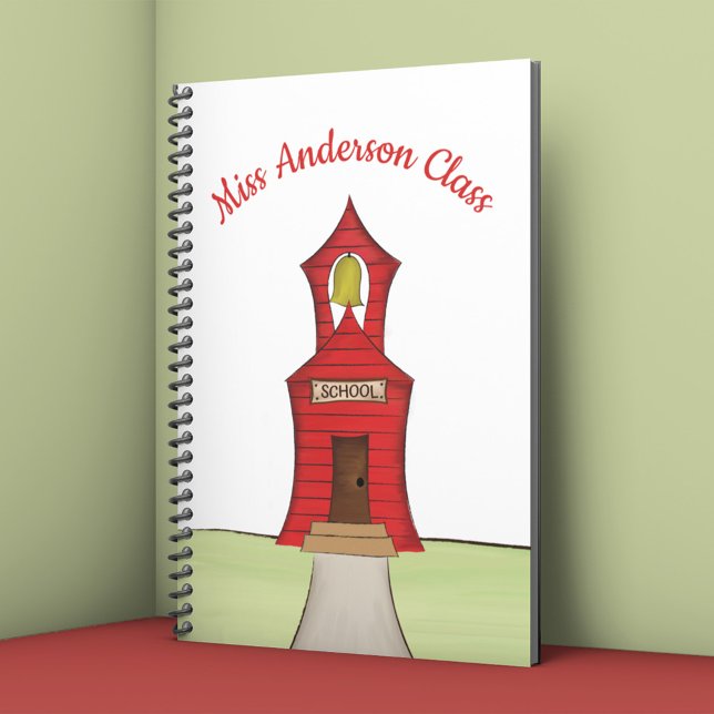 Cahier de classe personnalisé pour l'enseignant (Personalized teacher notebook with red schoolhouse illustration and custom class name.)