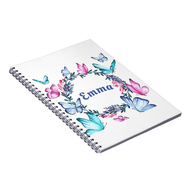 Cahier de photos en spirale pour nom de papillon (A beautifully illustrated notebook featuring a vibrant floral wreath.  )