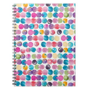 Cahier éclaboussé d'aquarelle lumineuse
