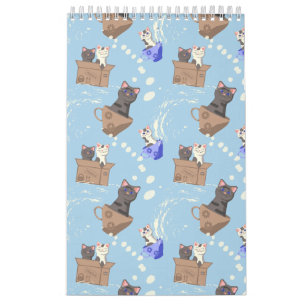 Calendrier Chats en boîte et gouttes de lait sur bleu