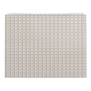 Calendrier un arrière - plan blanc avec un motif marron