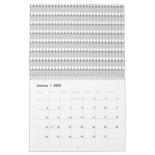 Calendrier Une chaîne de montagnes enneigée sous un bleu clai