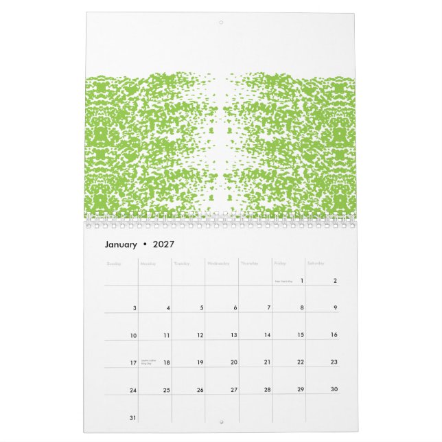 Calendrier Une femme portant un pull gris et des lunettes est (Jan 2027)