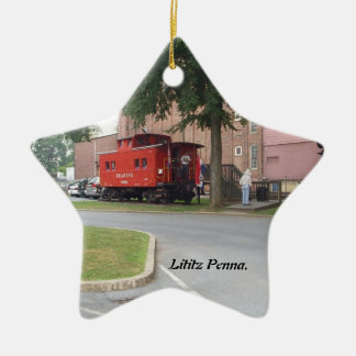Cambuse rouge en ornement de Noël de penne de