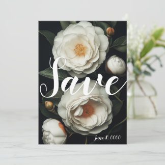 Camélias blancs sur un arrière - plan sombre