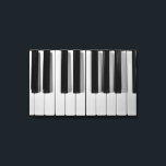 Canevas étirées personnalisées pour clavier de pia<br><div class="desc">Que vous soyez un virtuose du piano ou quelqu'un qui peut à peine jouer à Chopsticks,  vous êtes sûr d'aimer cette Piano Keyboard noir et blanc Custom Stretched Canvas Print.</div>