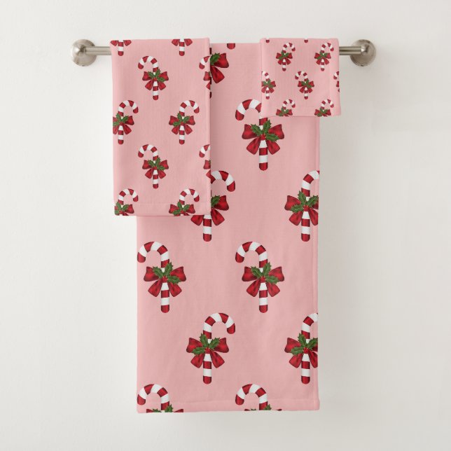 Canne de Noël rouge et blanche à motif sur fond ro (En situation)