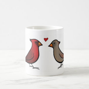 Cardinaux dans la tasse d'amour