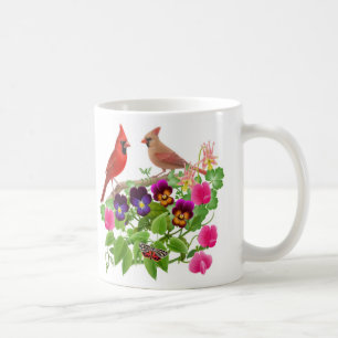 Cardinaux dans la tasse de jardin