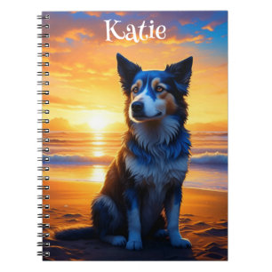 Carnet Adorable chien assis sur l'Ocean Beach au coucher 