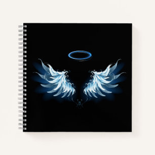 Carnet Blue Glowing Angel Wings on black background
