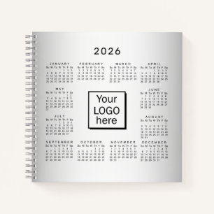 Carnet Calendrier 2026 sur fond gris flou avec logo perso