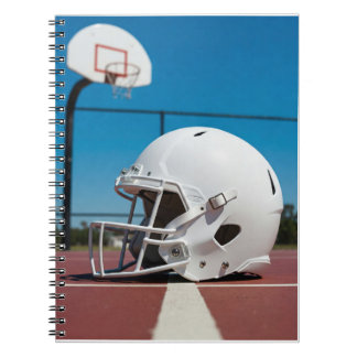 Carnet Casque de football blanc sur la ligne du terrain