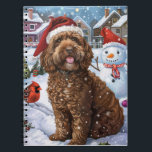 Carnet Cockapoo Winter Wonderland Christmas Joy<br><div class="desc">Ce design festif reflète l'esprit joyeux de la période des fêtes, avec un adorable petit portant un chapeau de Père Noël. Le chien est niché dans un pays des merveilles hivernales, avec un bonhomme de neige, un sapin de Noël décoré et des cadeaux joliment emballés. Les flocons de neige tombent...</div>